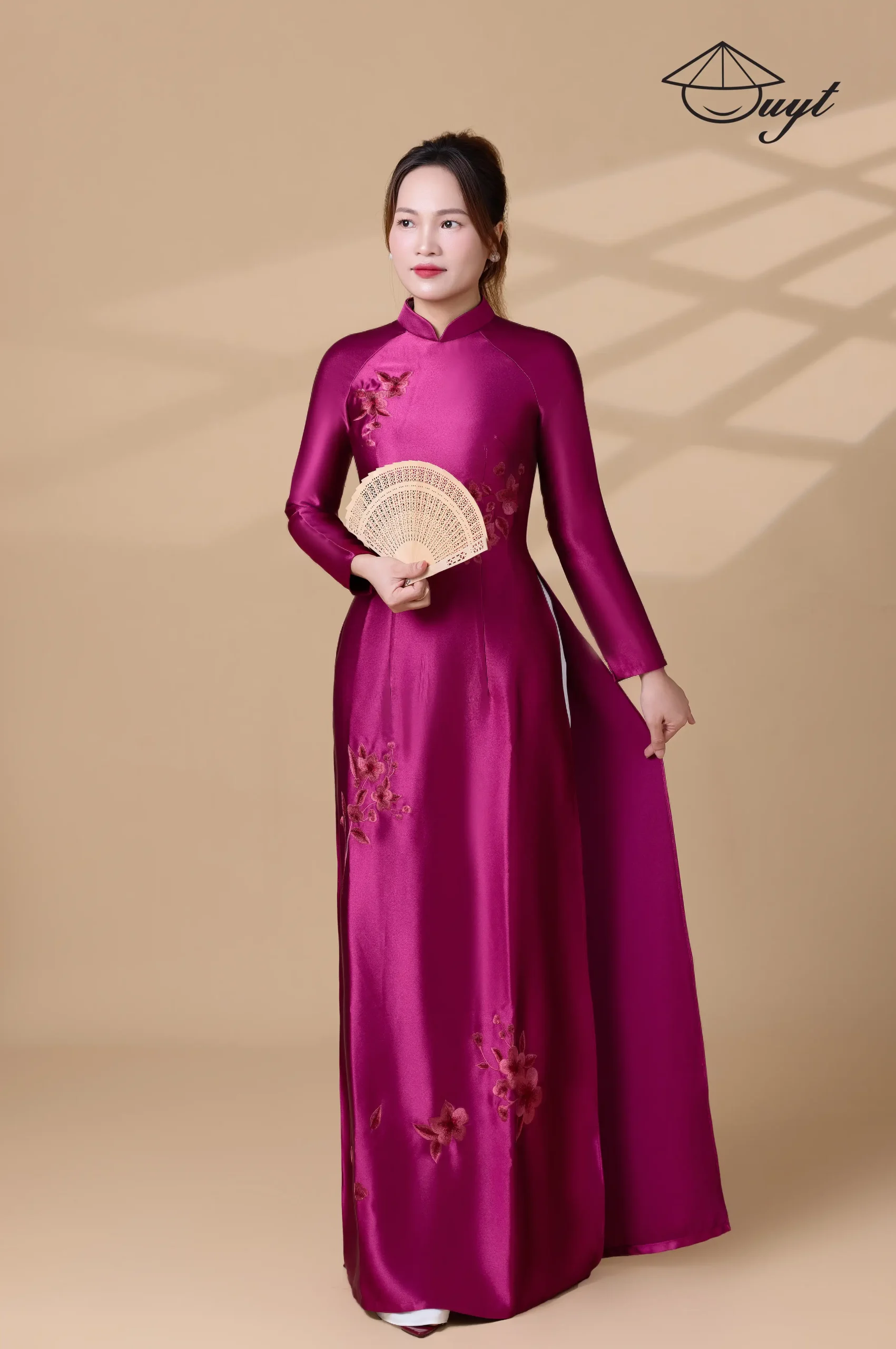 Áo dài màu tím hồng